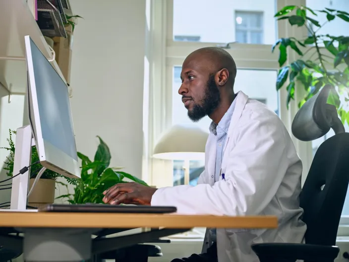 Doctor working on computer
