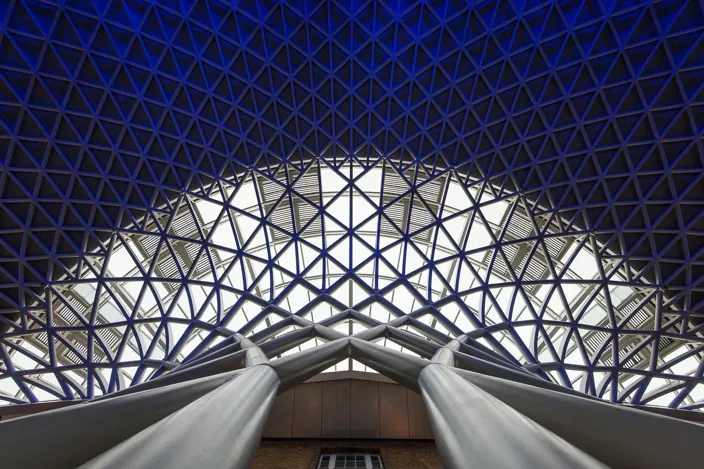 LONDON - APRIL 13, 2013: Architecture detail inside King's Cross railway station. The annual rail passenger usage between 2011 - 2012 was 27.874 million.