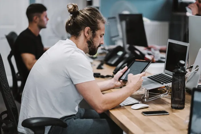 guy working with tablet at the office