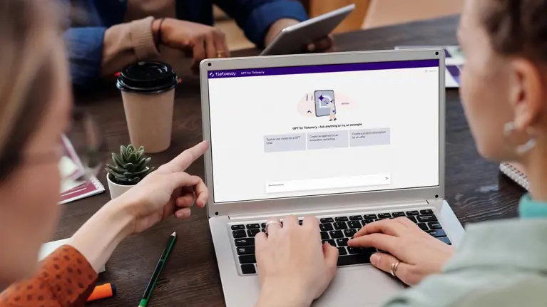 Multiple people working together and using Ai