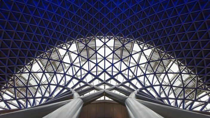 LONDON - APRIL 13, 2013: Architecture detail inside King's Cross railway station. The annual rail passenger usage between 2011 - 2012 was 27.874 million.