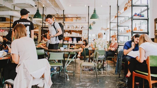 young people hanging out in a coffee shop