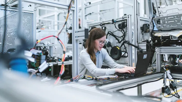 woman working on a project in a lab